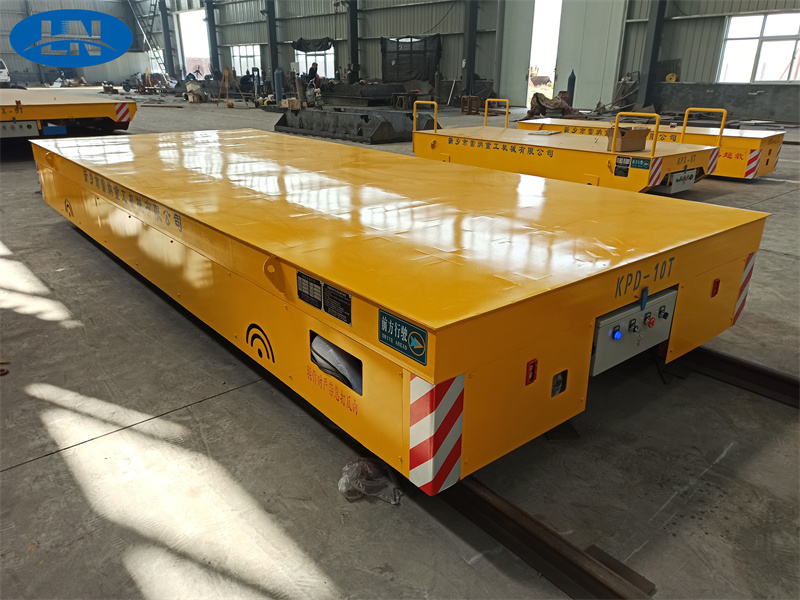 Sammendrag og anvendelse af elektrisk overførselsvogn